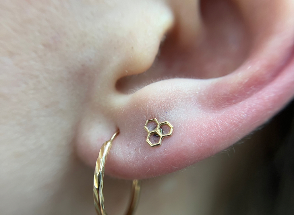 Прокол мочки