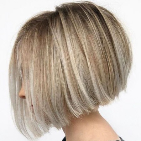 Женские стрижки средней длины