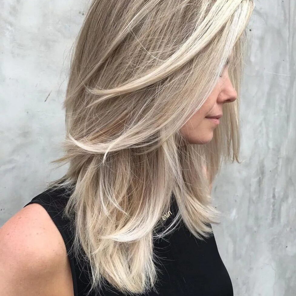 Женская стрижка на длинные волосы