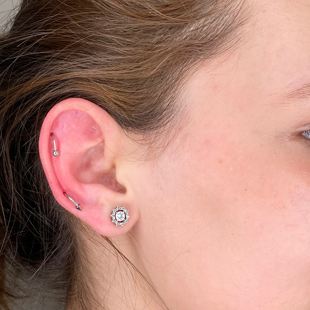 Пирсинг мочки уха