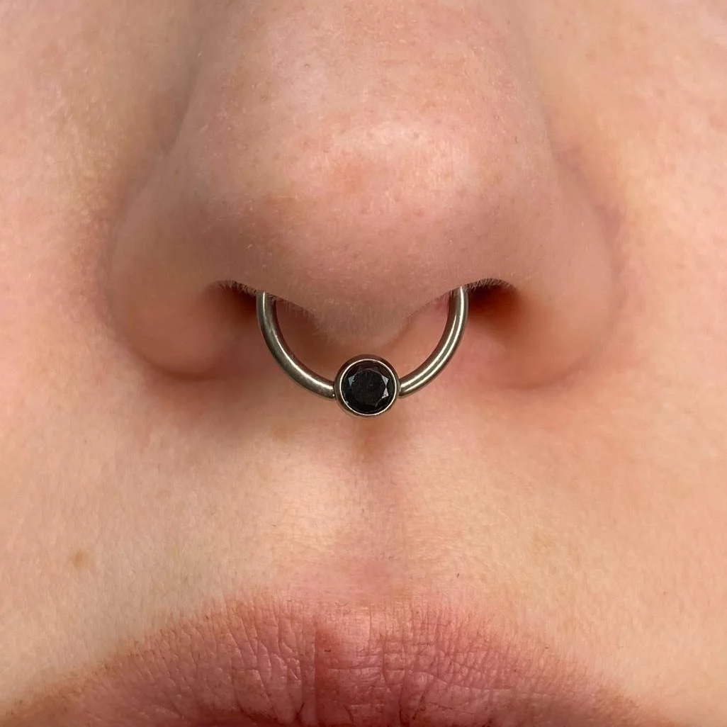 Септум (Пирсинг перегородки носа)