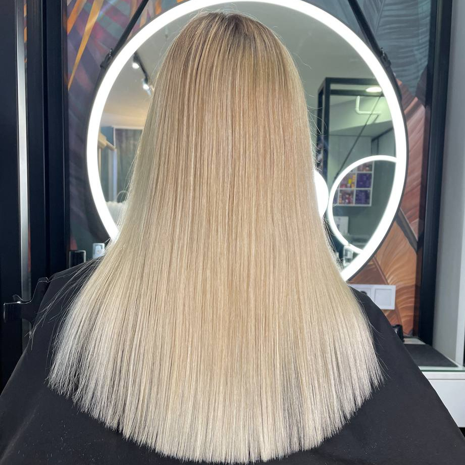 Стрижка женская 1 срезом сложная, длинные волосы (длинна от плеч)