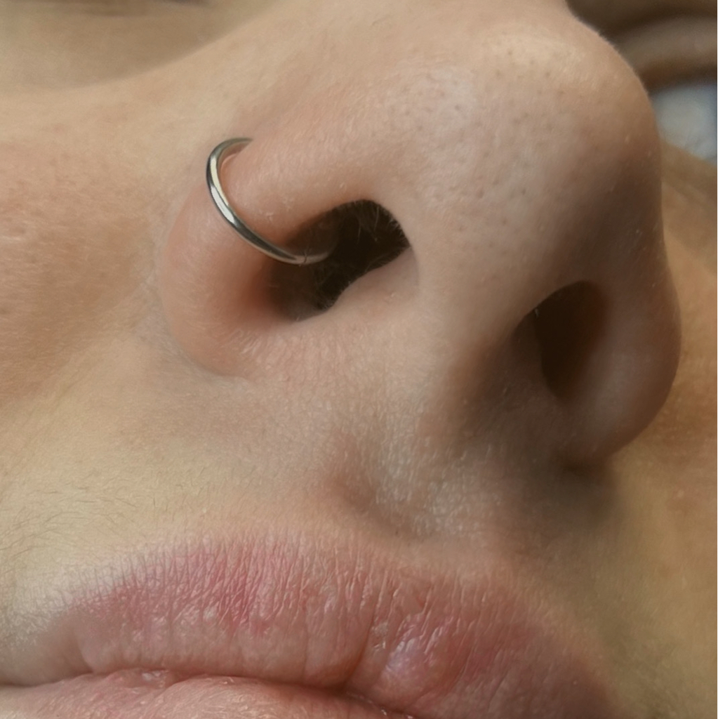 Прокол крыла носа